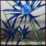 Based on a client's photograph, I created a composition of thistle flowers for her garden. Based on a client's photograph, I created a composition of thistle flowers for her garden.