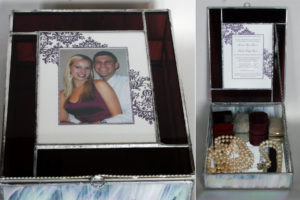 Lovely box for special items matching the bride's dress and the background color of their wedding invitation.